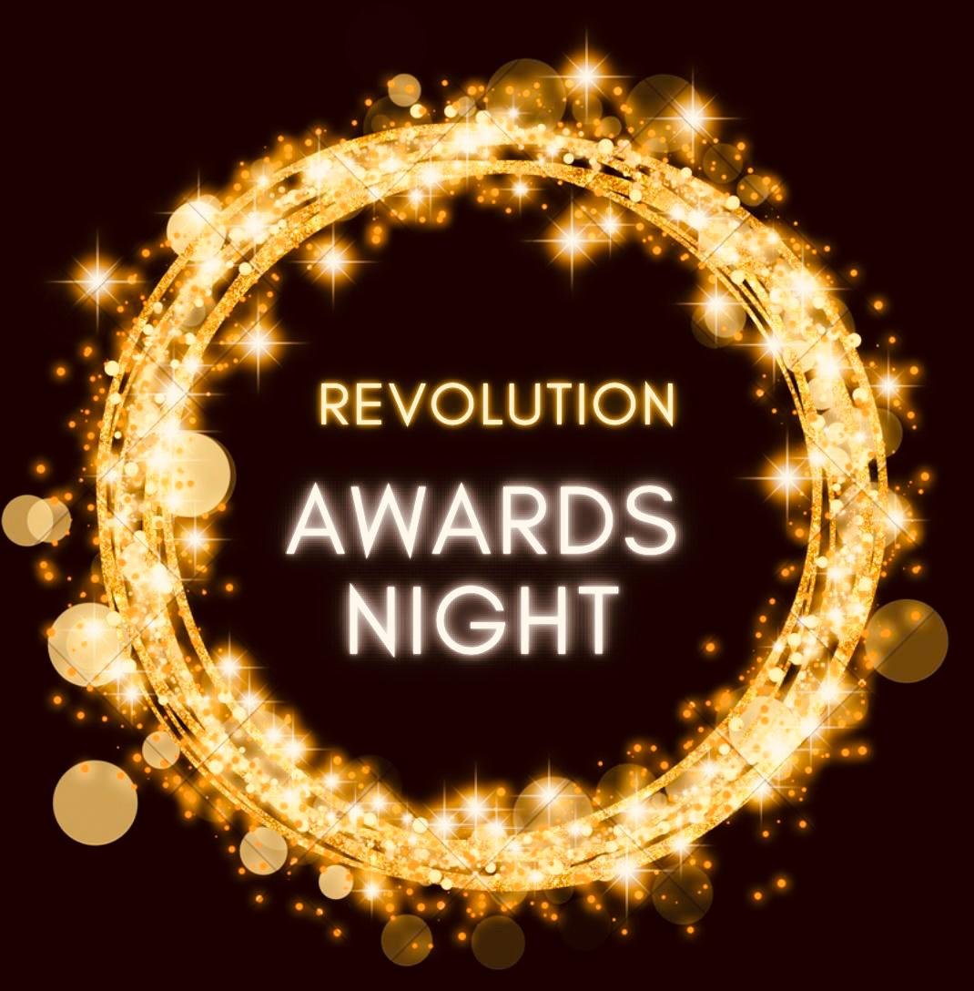 Revolution Awards Night - gold glitter ring on a dark background